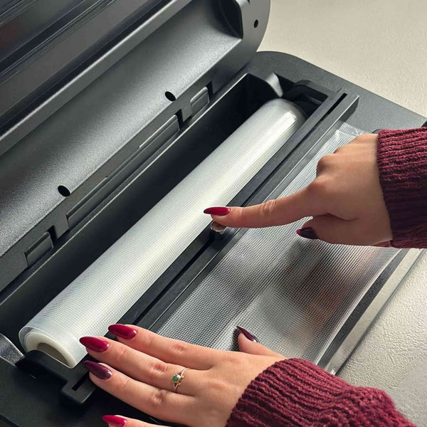 met behulp van een vacuümmachine